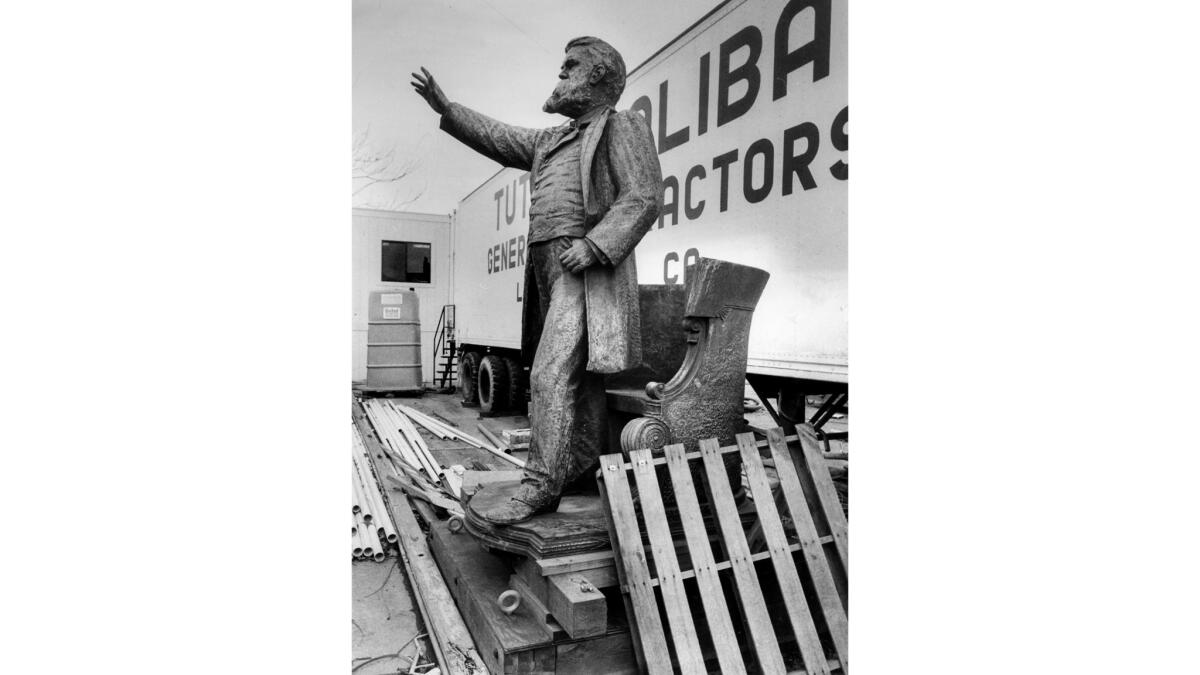 Jan. 7, 1987: Statue of former U.S. Sen. Stephen M. White stands in the corner of a utility yard at 1st. and Olive. This photo appeared in the Jan. 28, 1988, Los Angeles Times.
