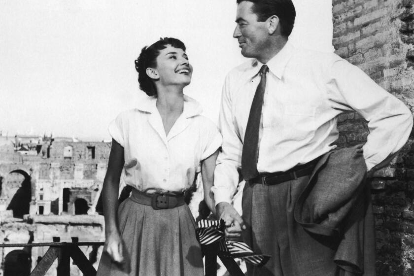 Audrey Hepburn with Gregory Peck in a still from the 1953 film "Roman Holiday."