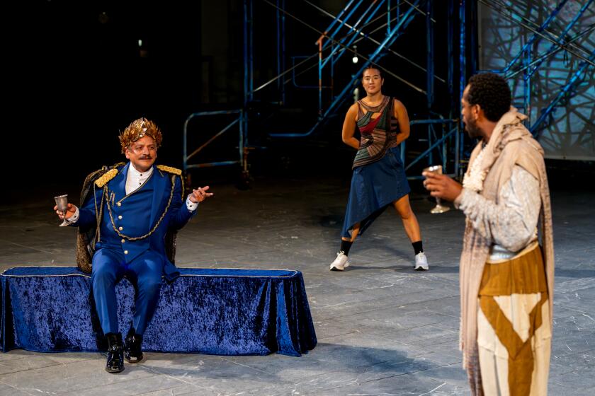 Jesse J. Perez as Priam and Eric Berryman as Memnon in foreground, and Holly Hwang Belshaw as Chorus in background. ? 2024 J. Paul Getty Trust