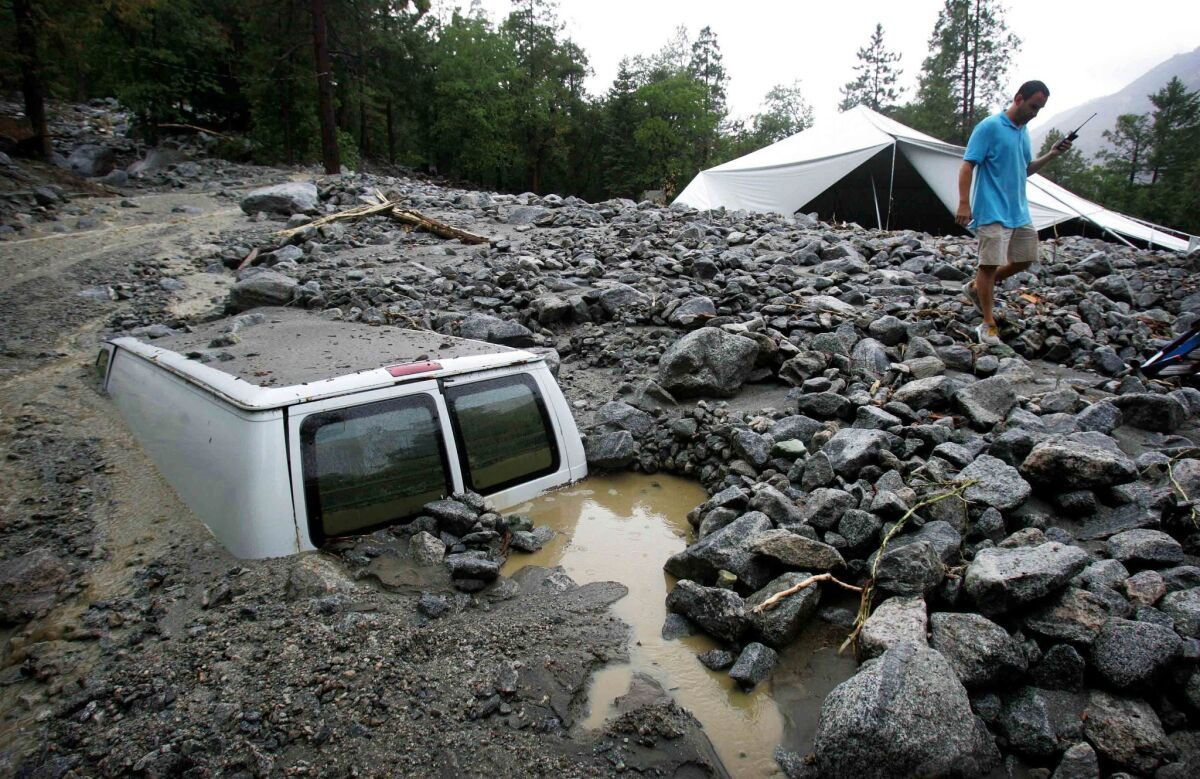 Van buried in mud and rocks after thunderstorm