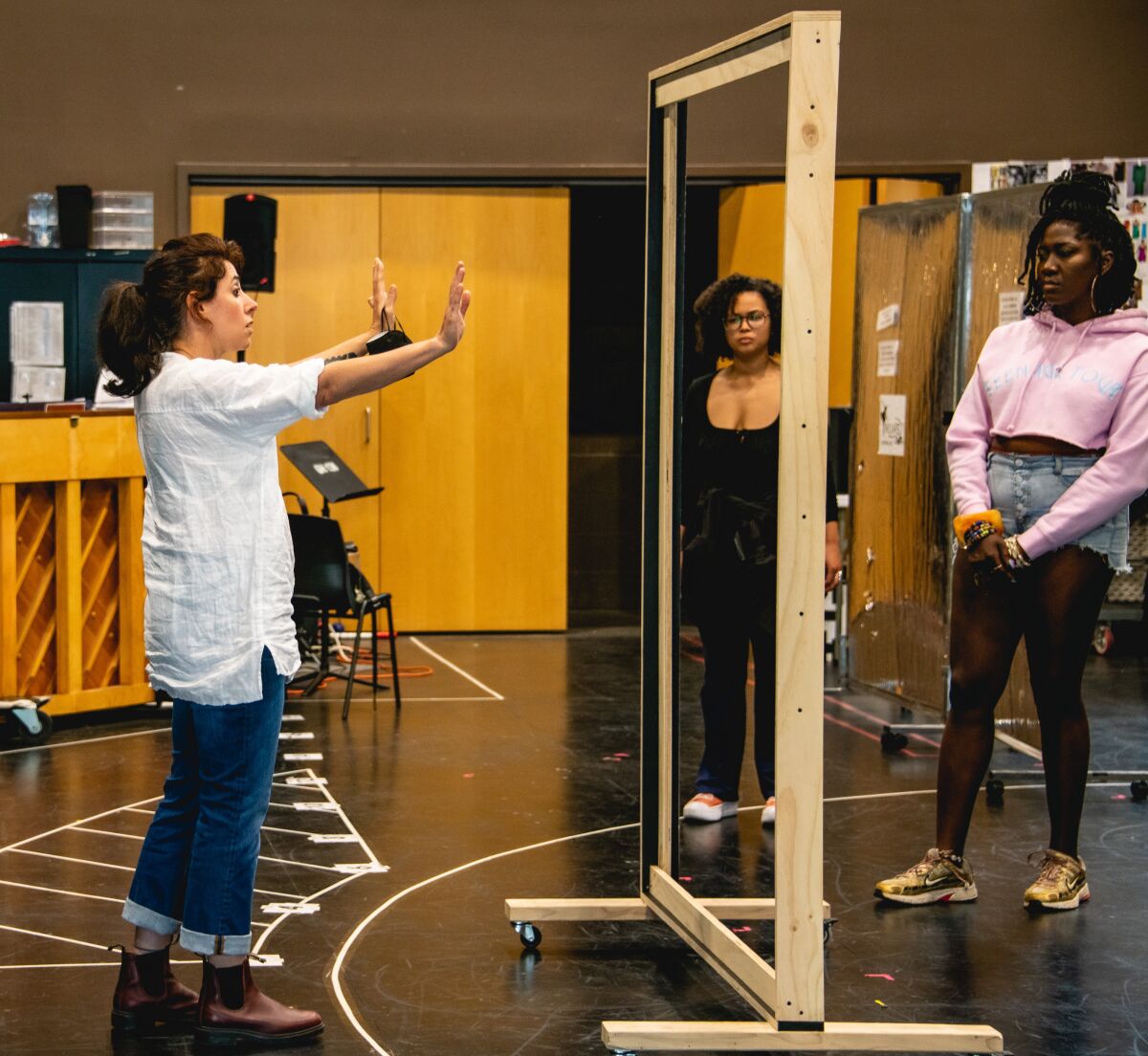 Director Rachel Chavkin, left, with actors Jordan Tyson and Amber Iman rehearse a scene for "Lempicka" at La Jolla Playhouse.