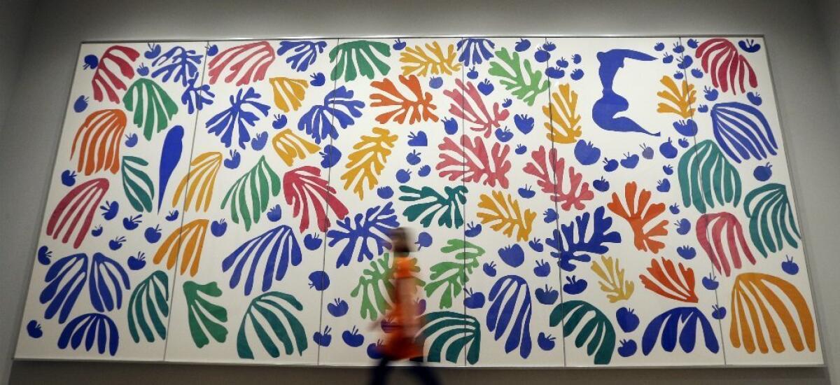 Henri Matisse's "The Parakeet and the Mermaid" (1952), which is part of the exhibition "Henri Matisse: The Cut-Outs" at the Tate Modern in London.