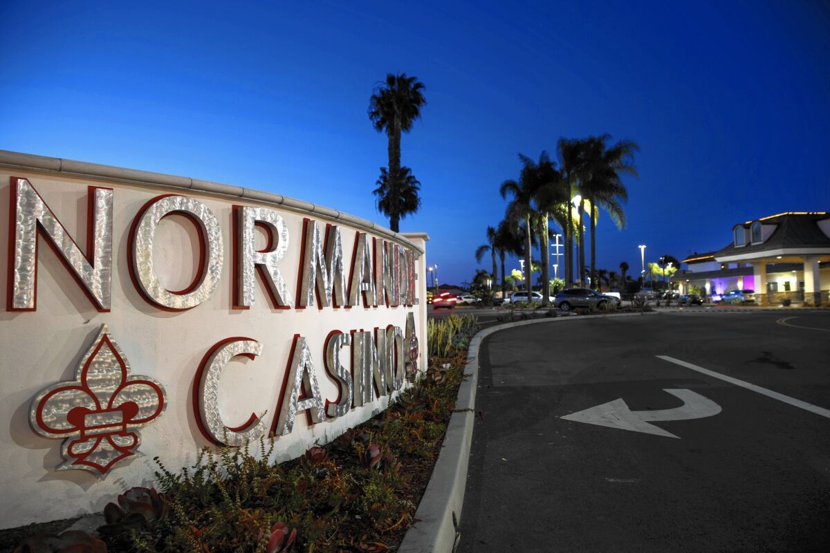Larry Flynt threatened to shut down the former Normandie Casino, now known as Larry Flynt's Lucky Lady Casino, after Gardena City Council members approved a measure requiring the adult entertainment mogul to contribute $800,000 monthly to the city.