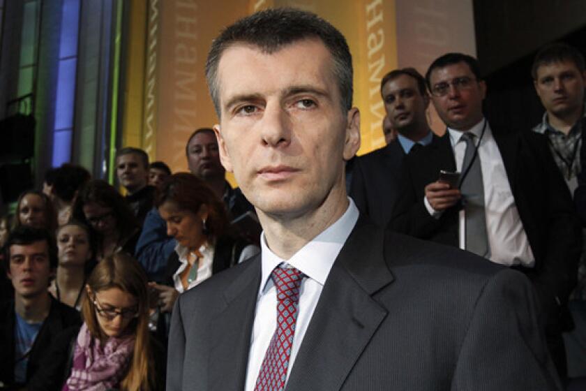 Brooklyn Nets owner Mikhail Prokhorov says he doesn't need to be courtside in order to watch his team play.