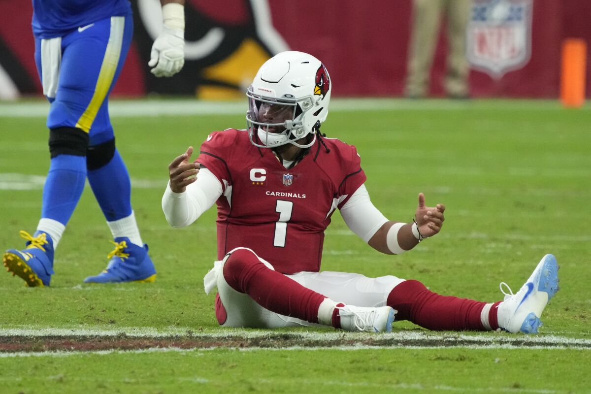 Arizona Cardinals quarterback Kyler Murray (1) reacts after a play against the Los Angeles Ramsduring the second half of an NFL football game, Sunday, Sept. 25, 2022, in Glendale, Ariz. (AP Photo/Rick Scuteri)