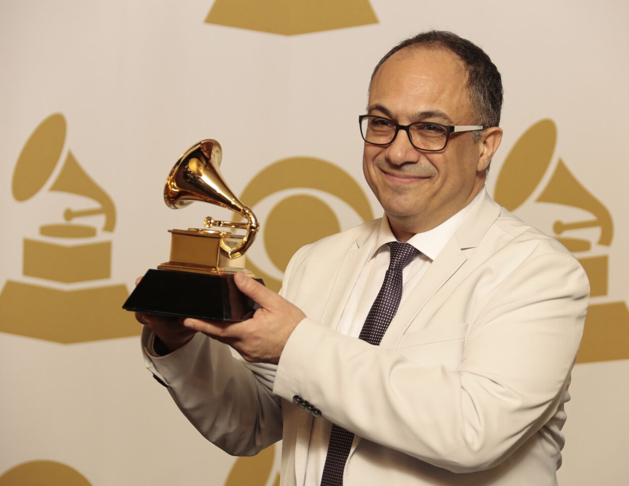 Ashley Kahn wins the album notes Grammy with "Offering: Live At Temple University."