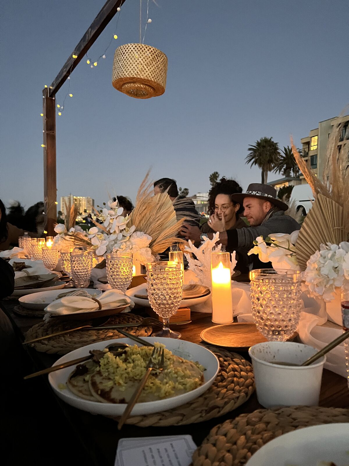 Guests lingered over food and conversation long past sunset.