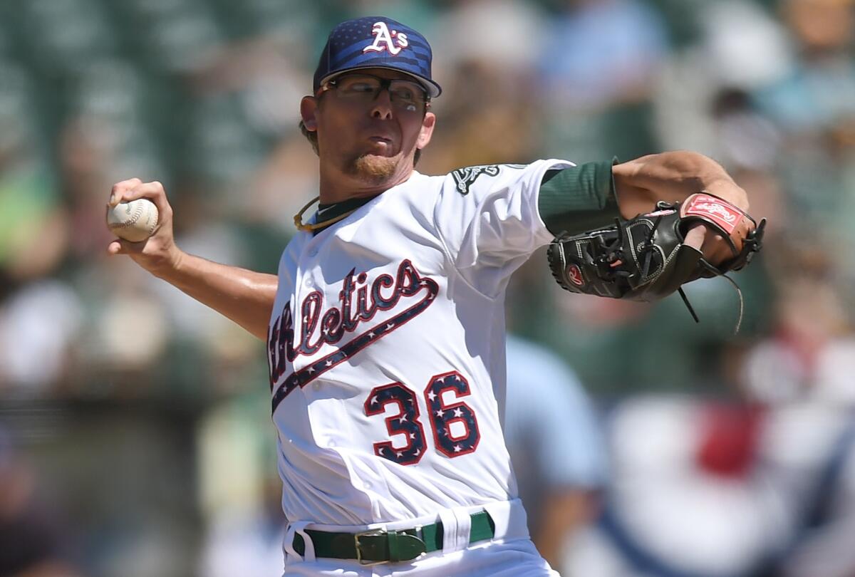 Athletics closer Tyler Clippard pitches a scoreless ninth inning to earn a save against the Mariners on July 4.
