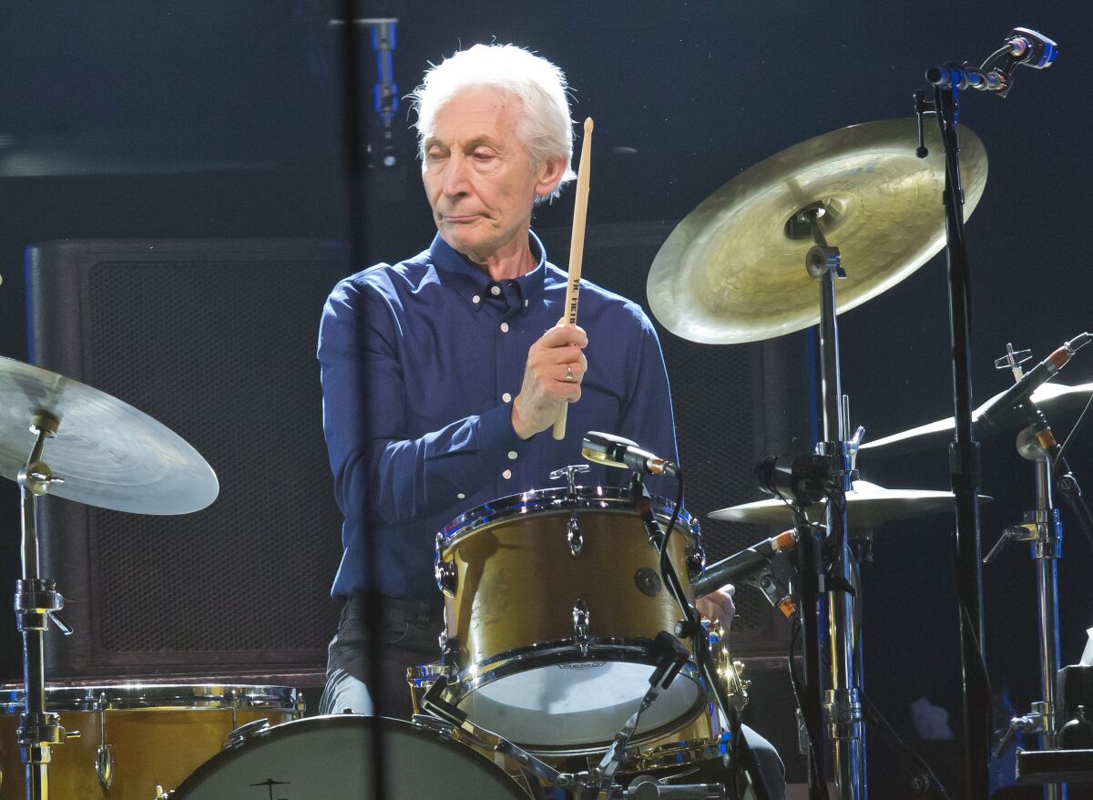 FILE - Charlie Watts, of the Rolling Stones, performs during a concert