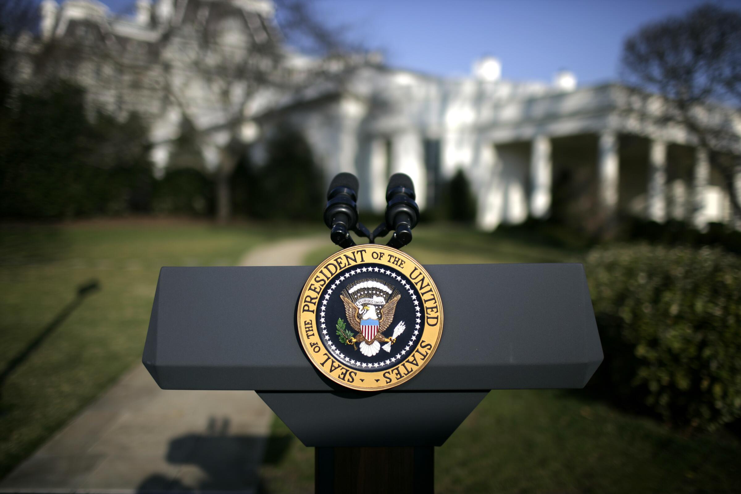 A lectern with the presidential seal on the South Lawn of the White House.