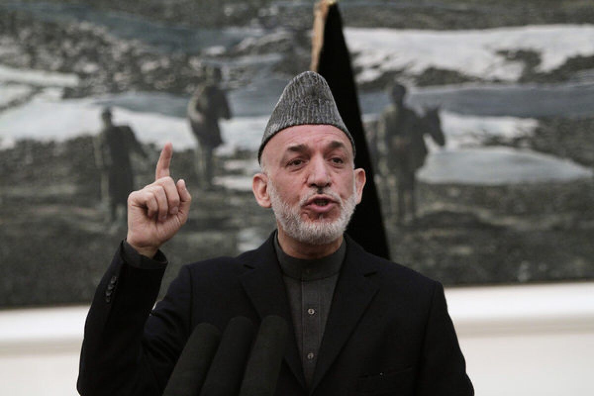 Afghanistan President Hamid Karzai speaks Saturday during a news conference at the presidential palace in Kabul
