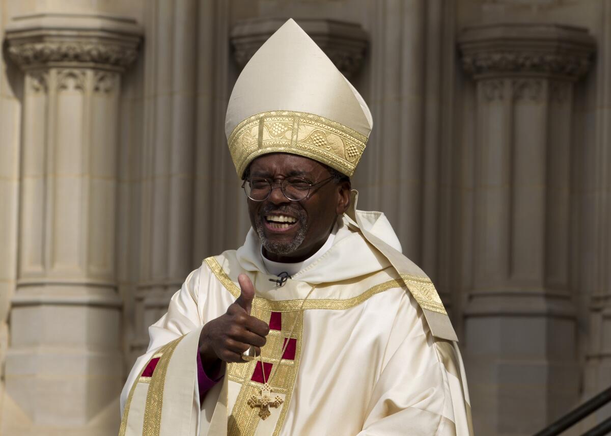 Episcopal Church Presiding Bishop-elect Michael Curry arrives at the Washington National Cathedral on Sunday.