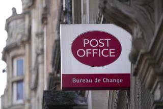 A logo of post office is displayed in London, Wednesday, Jan. 10, 2024. Britain's Prime Minister Rishi Sunak says he will introduce measures to overturn the convictions of more than 700 post office branch managers who were wrongly accused of theft or fraud because of a faulty computer system. (AP Photo/Kin Cheung)