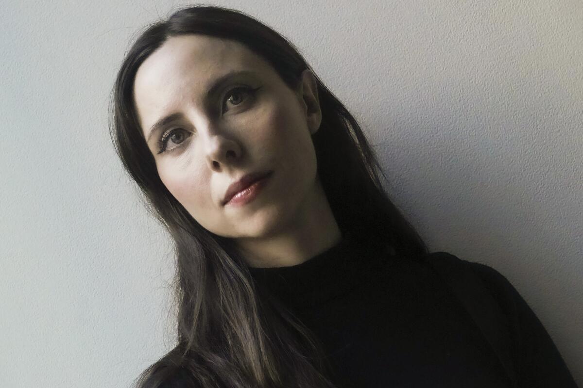 Erica Mancini, an accordionist, poses before performing in a Ukrainian avant garde jazz opera in New York. 