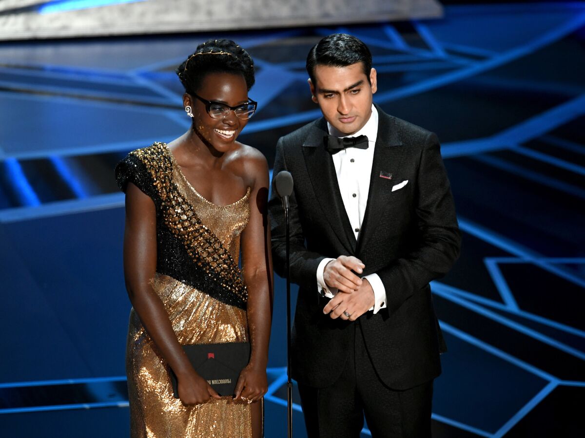 Presenters Lupita Nyong'o, left, and Kumail Nanjiani give a shout-out to "all the 'Dreamers' out there" at Sunday's Oscars.