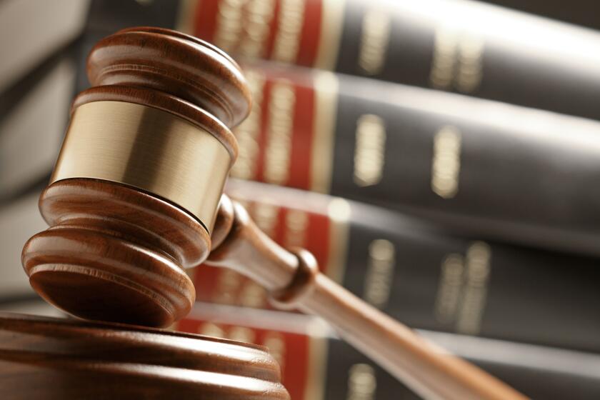 A lawsuit filed in Los Angeles County Superior Court says a California rehab center hired and promoted accused white supremacists and didn’t address harassment and discrimination at work. Getty Images/iStockphoto A gavel rests on its sounding block which sits in front of a stack of law books. The image is photographed with a very shallow depth of field.