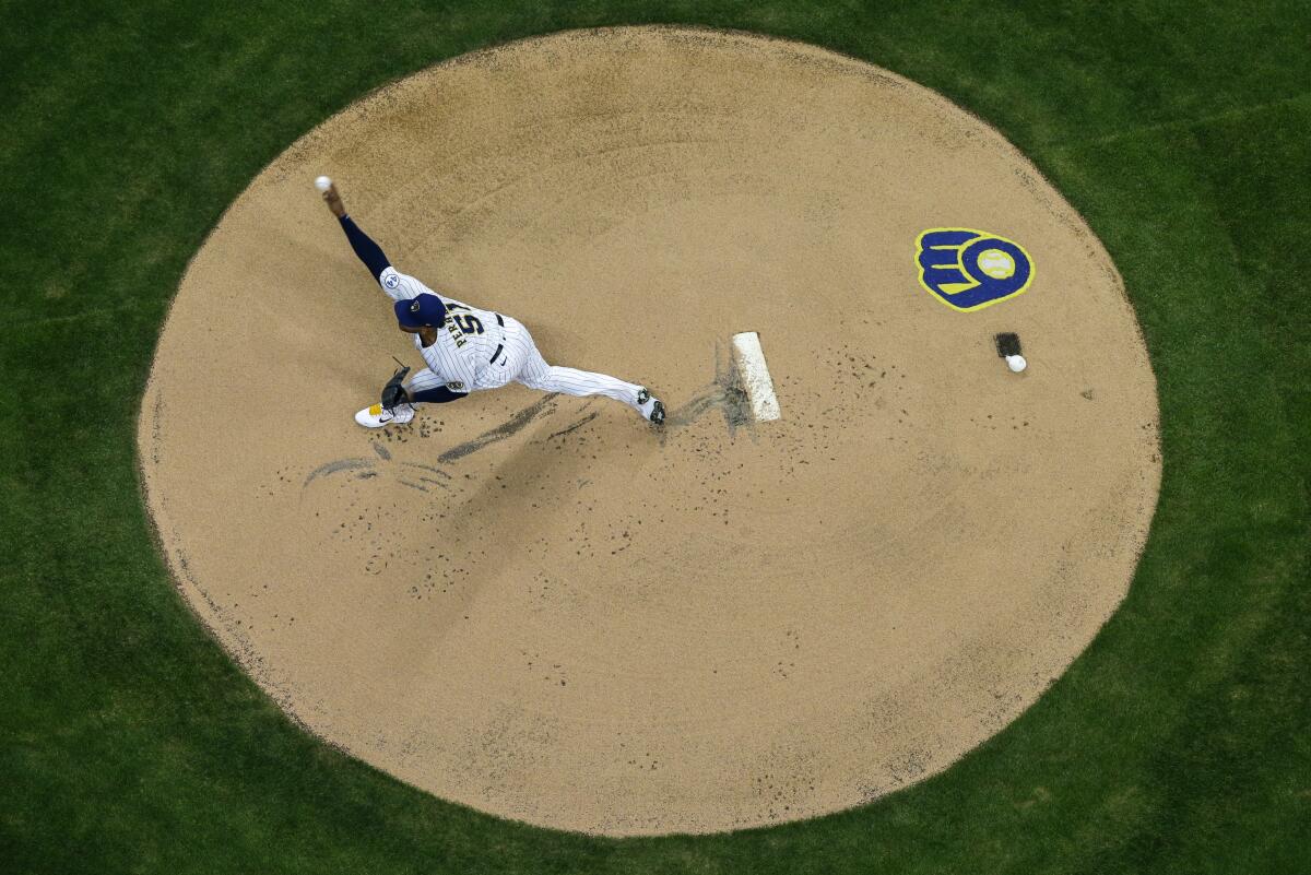 Milwaukee Brewers starting pitcher Freddy Peralta delivers during the first inning Friday.