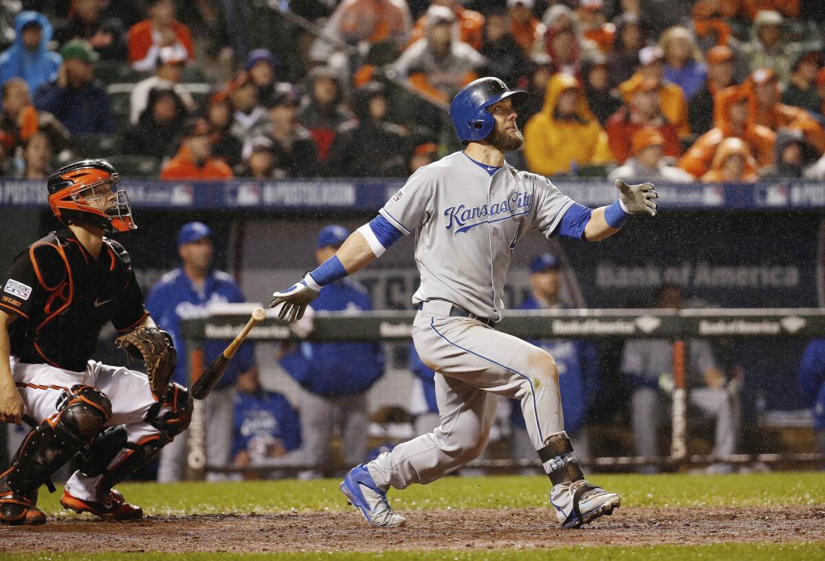 Royals outfielder Alex Gordon (4) watches his solo home run during the 10th inning of Game 1 of the ALCS against the Orioles.