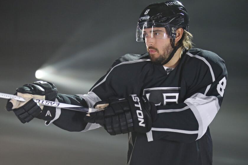 Kings defenseman Drew Doughty participates in on-ice activities while waiting for TV interviews during the 2015 NHL Player Media Tour.