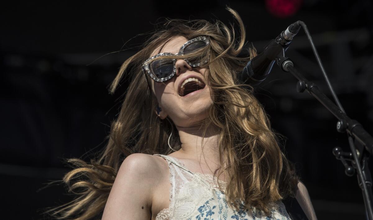 First Aid Kit's Johanna Soderberg performs on stage.