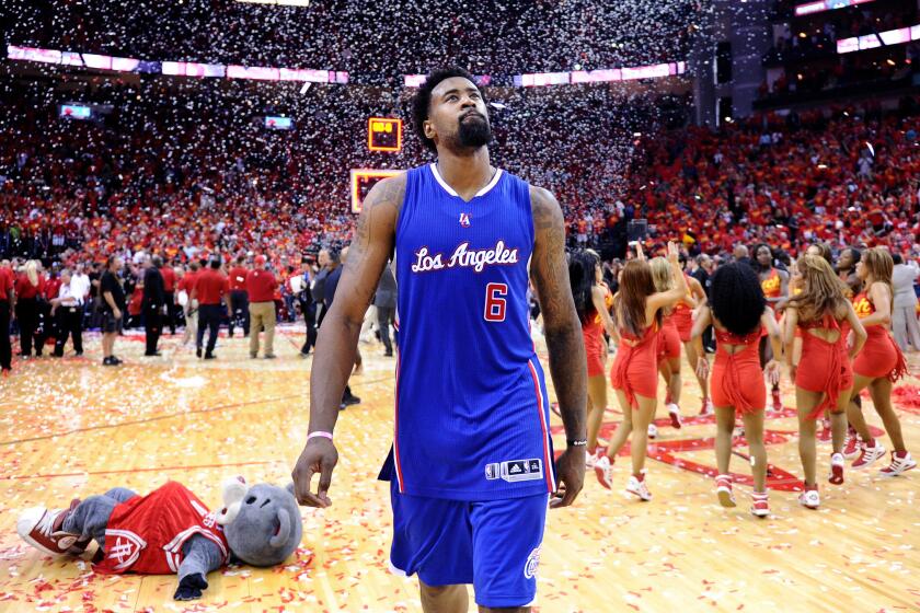 DeAndre Jordan walks off the court after the Clippers were eliminated by the Houston Rockets in Game 7 of the second round of the Western Conference playoffs on May 17.