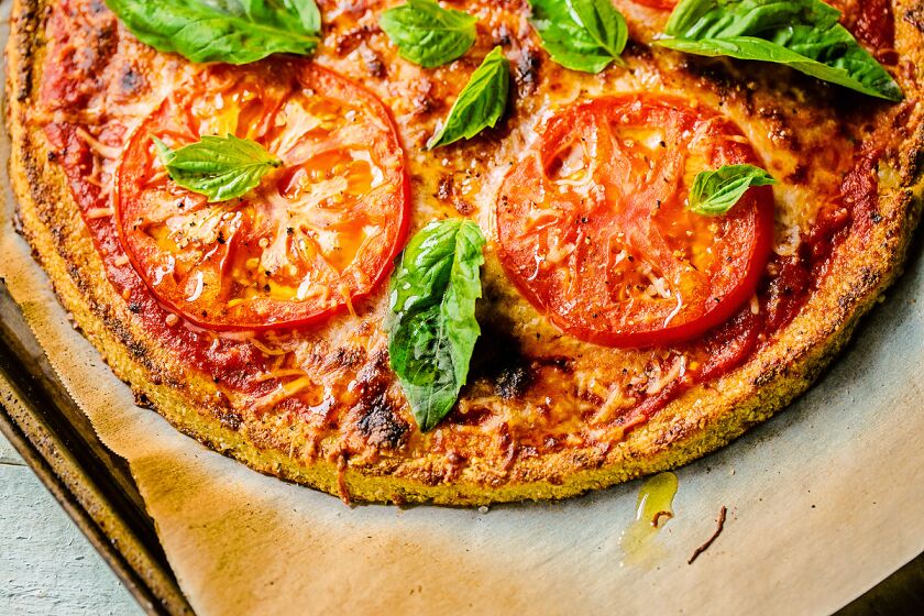 Margherita pizza with a cauliflower-based crust.