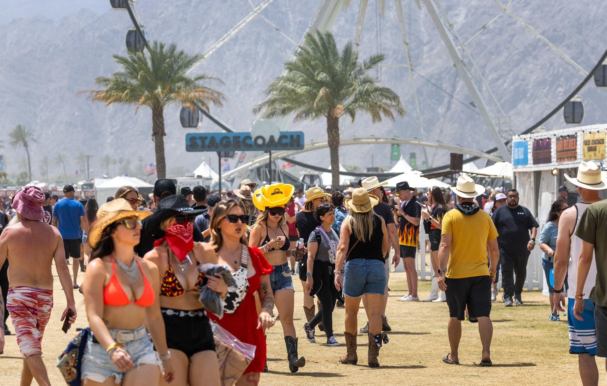 Thousands of country music fans arrive at Stagecoach and some make a dash for the best 