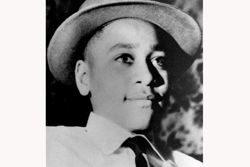 FILE - This undated photo shows Emmett Louis Till, a 14-year-old black Chicago boy, who was kidnapped, tortured and murdered in 1955 after he allegedly whistled at a white woman in Mississippi. The U.S. Justice Department told relatives of Emmett Till on Monday, Dec. 6, 2021 that it is ending its investigation into the 1955 lynching of the Black teenager from Chicago who was abducted, tortured and killed after witnesses said he whistled at a white woman in Mississippi. (AP Photo, File)