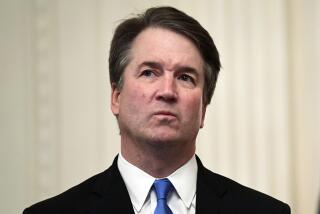 Supreme Court Justice Brett Kavanaugh stands before a ceremonial swearing-in at the White House on Oct. 8, 2018.
