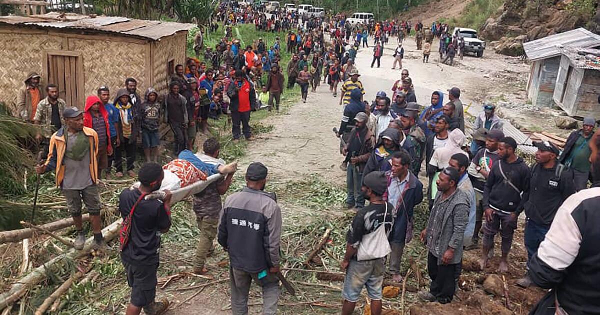 Landslide in Papua New Guinea claims an estimated 100 lives; emergency convoy brings relief supplies to survivors