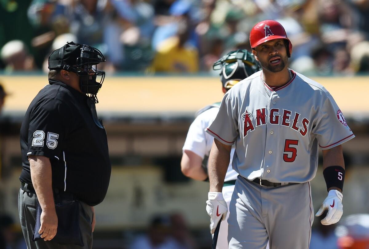 Albert Pujols reacts after being called out on strikes during a game against the Oakland Athletics on June 1.