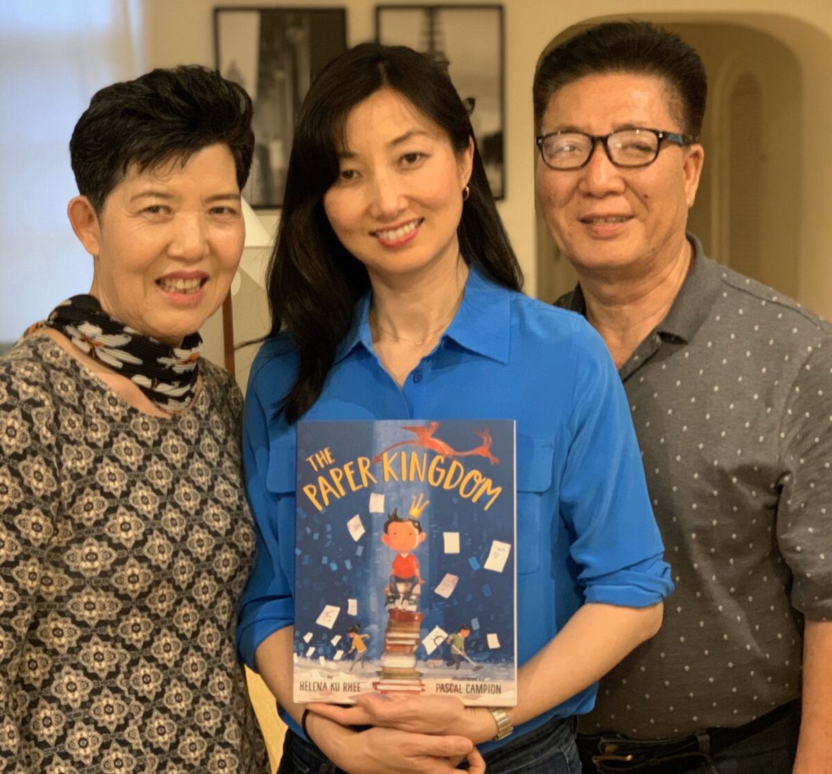 Helena Rhee with her parents. 