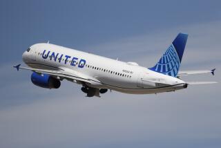 A United Airlines jetliner lifts off from a runway at Denver International Airport 