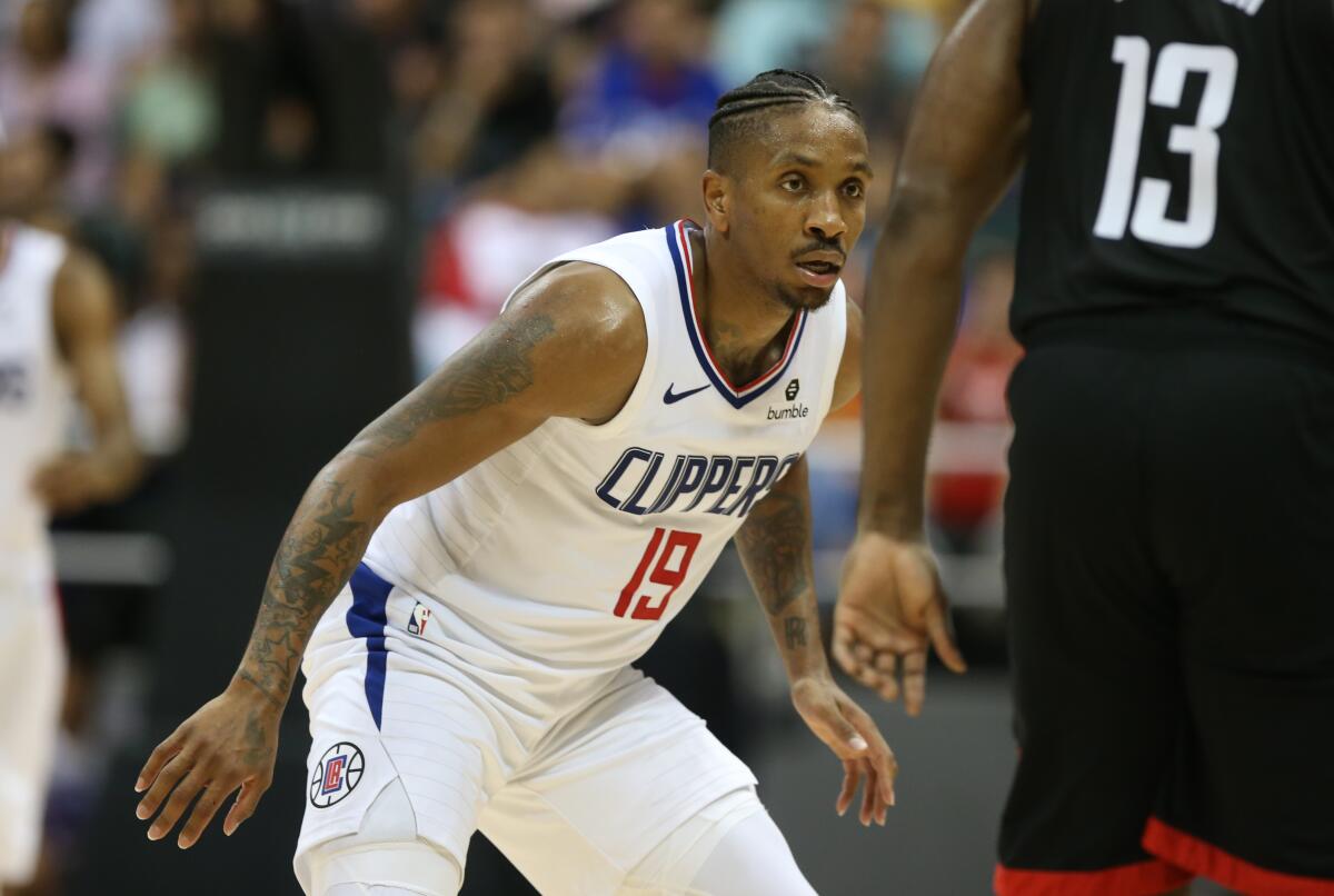 Clippers guard Rodney McGruder prepared to play defense during a game against the Rockets.