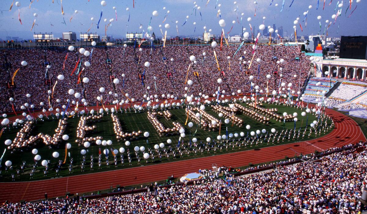 Balloons are released at the Coliseum during opening ceremonies of the 1984 Olympic Games.