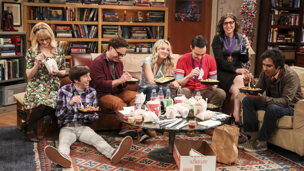 "The Big Bang Theory" stars, from left, Melissa Rauch, Simon Helberg, Johnny Galecki, Kaley Cuoco, Jim Parsons, Mayim Bialik and Kunal Nayyar appear in a scene from the series finale.