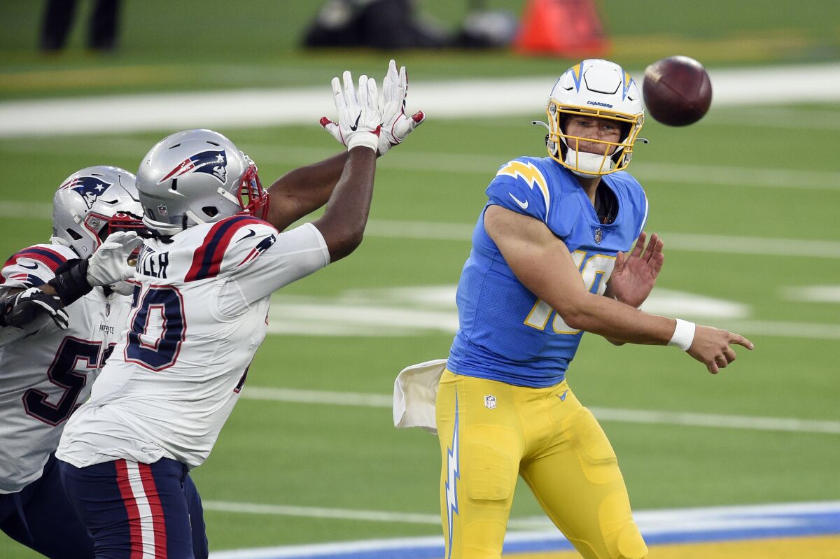 Chargers quarterback Justin Herbert throws against the New England Patriots on Dec. 6, 2020.