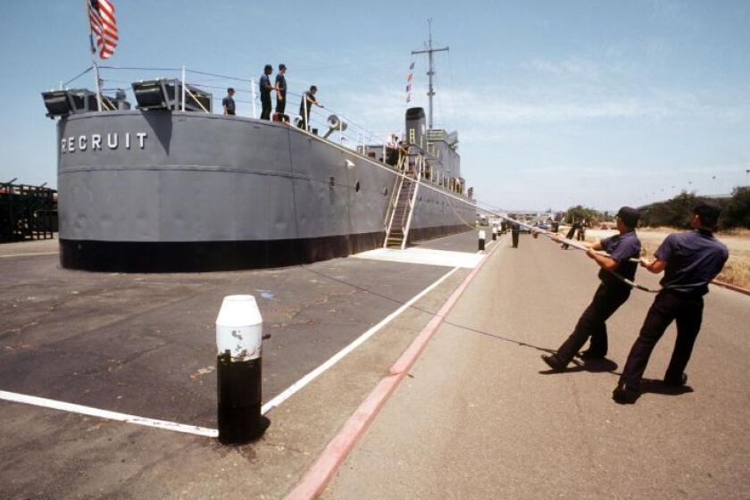 Recruits practice mooring the training destroyer escort USS Recruit at the Naval Training Center in Point Loma in 1980.
