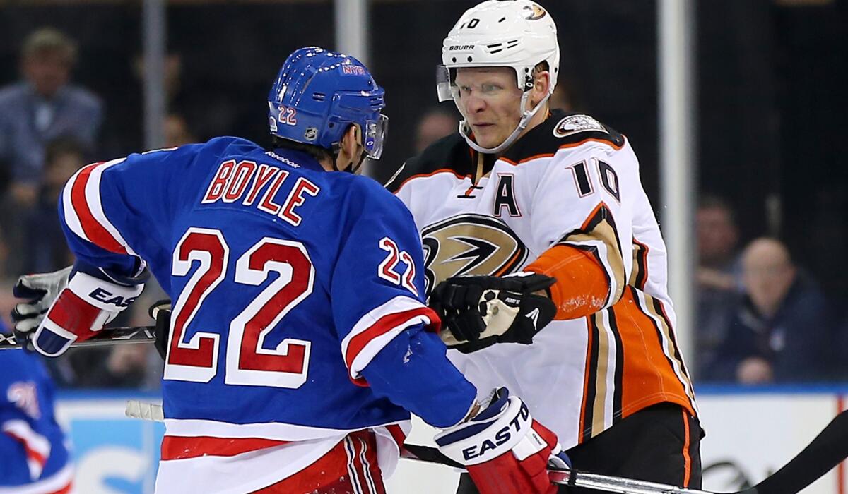 Ducks right wing Corey Perry (10) and Rangers defenseman Dan Boyle get into a shoving match in the first period of their game on Sunday at Madison Square Garden.