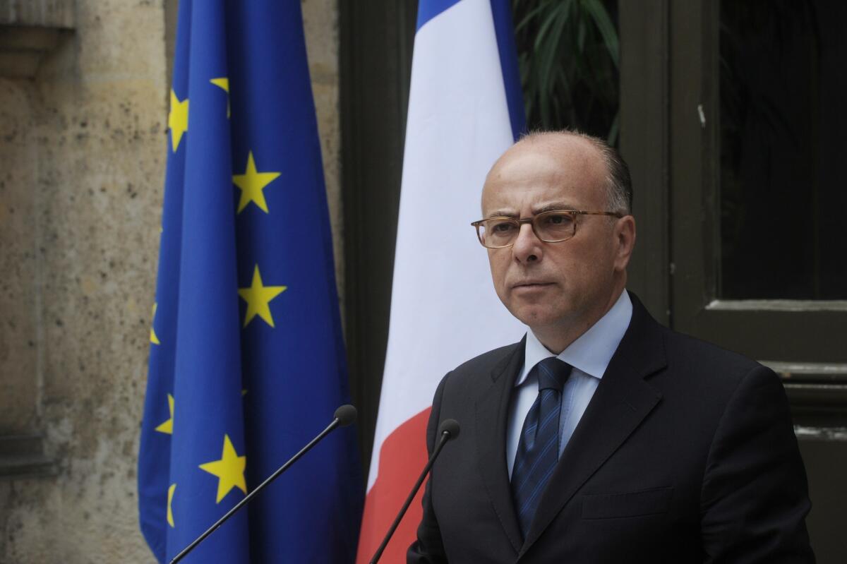 French Interior Minister Bernard Cazeneuve told families of young people who seemed inclined toward "violent radicalization" to contact his department. Above, Cazeneuve in Paris on Aug. 2.