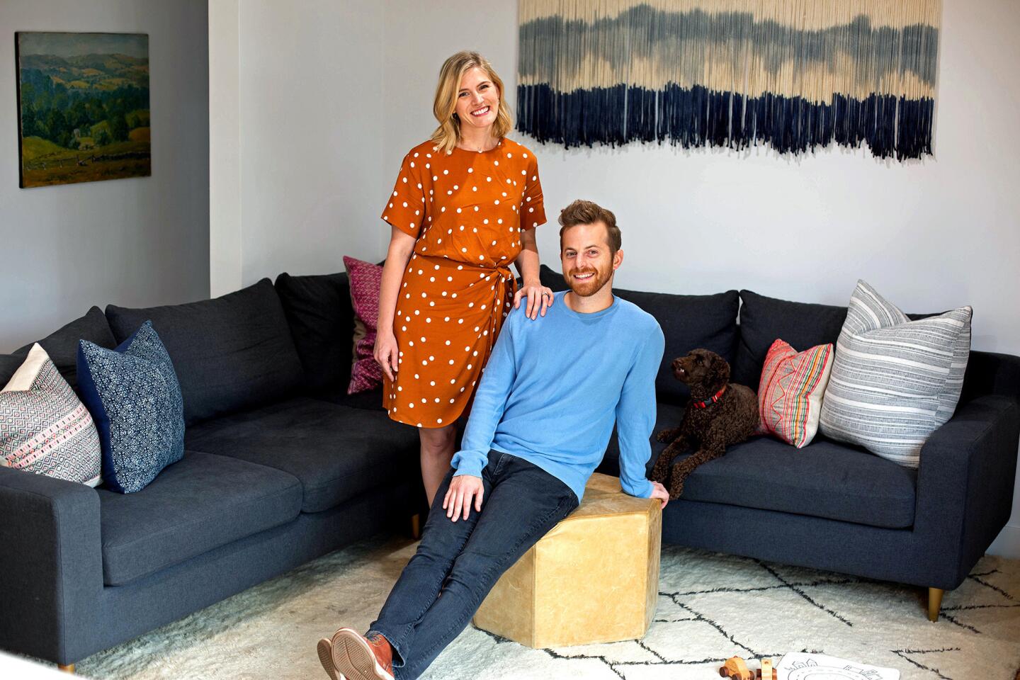 Try Guys comic Ned Fulmer and his wife, Ariel, in the living space of their newly designed and remodeled 1,300-square-foot Elysian Valley home.