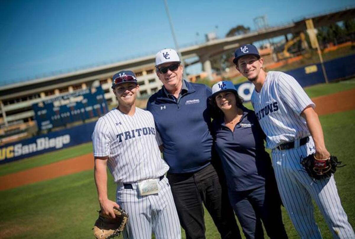 UC San Diego alum Gary Jacobs and his wife, Jerri-Ann (center), donated $1 million to fund athletic scholarships.