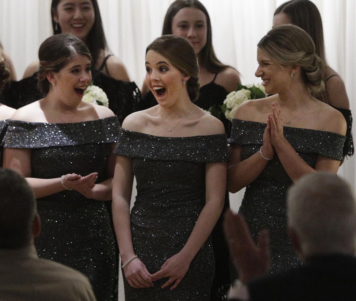 Ally Rayer reacts on being named 2020 Miss La Cañada Flintridge. She is surrounded by court members Audrey Melilo and Reese Ramseyer at the 108th Installation and Awards Gala at the La Cañada Flintridge Country Club on Jan. 30.