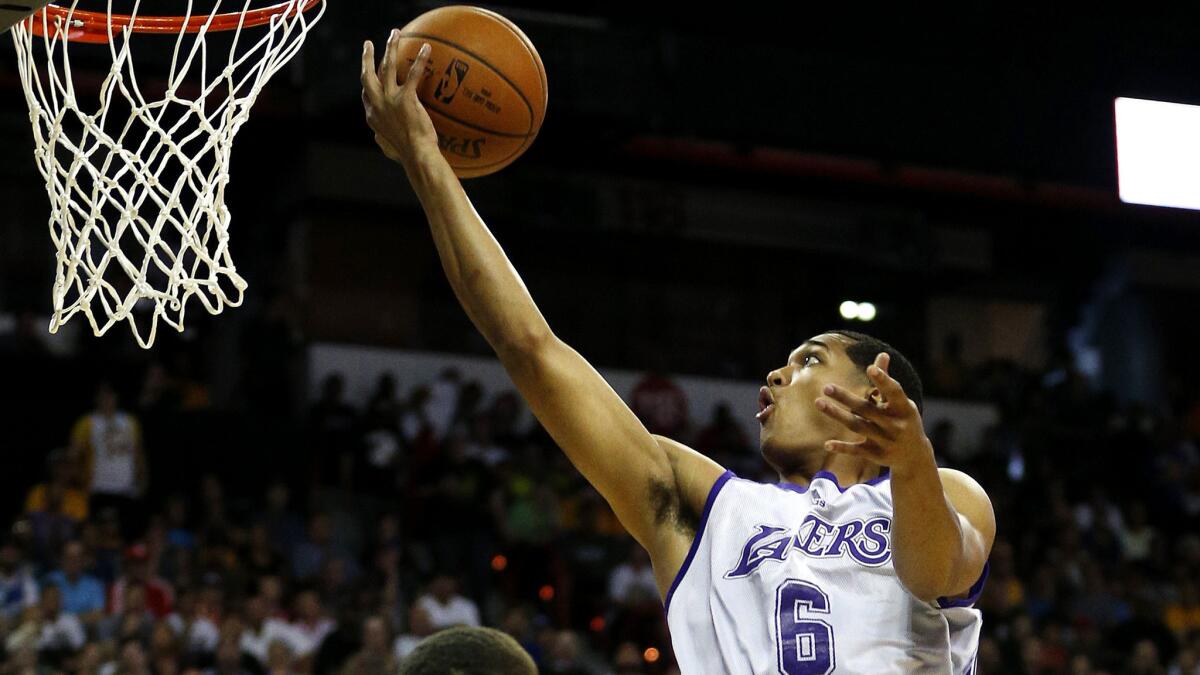 Lakers guard Jordan Clarkson drives for a layup against the Timberwolves in a summer league game Friday night in Las Vegas.