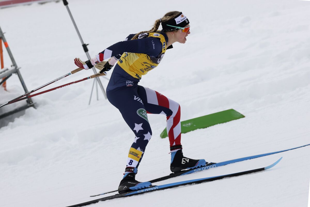 FILE - United States' Jessie Diggins competes during a women's Tour de Ski, cross-country ski sprint event, in Val di Fiemme, Italy, Jan. 9, 2021. Diggins and Rosie Brennan along with a revamped U.S. team head into the Beijing games with a list of podium finishes and hopes for earning more medals. (AP Photo/Alessandro Trovati, File)