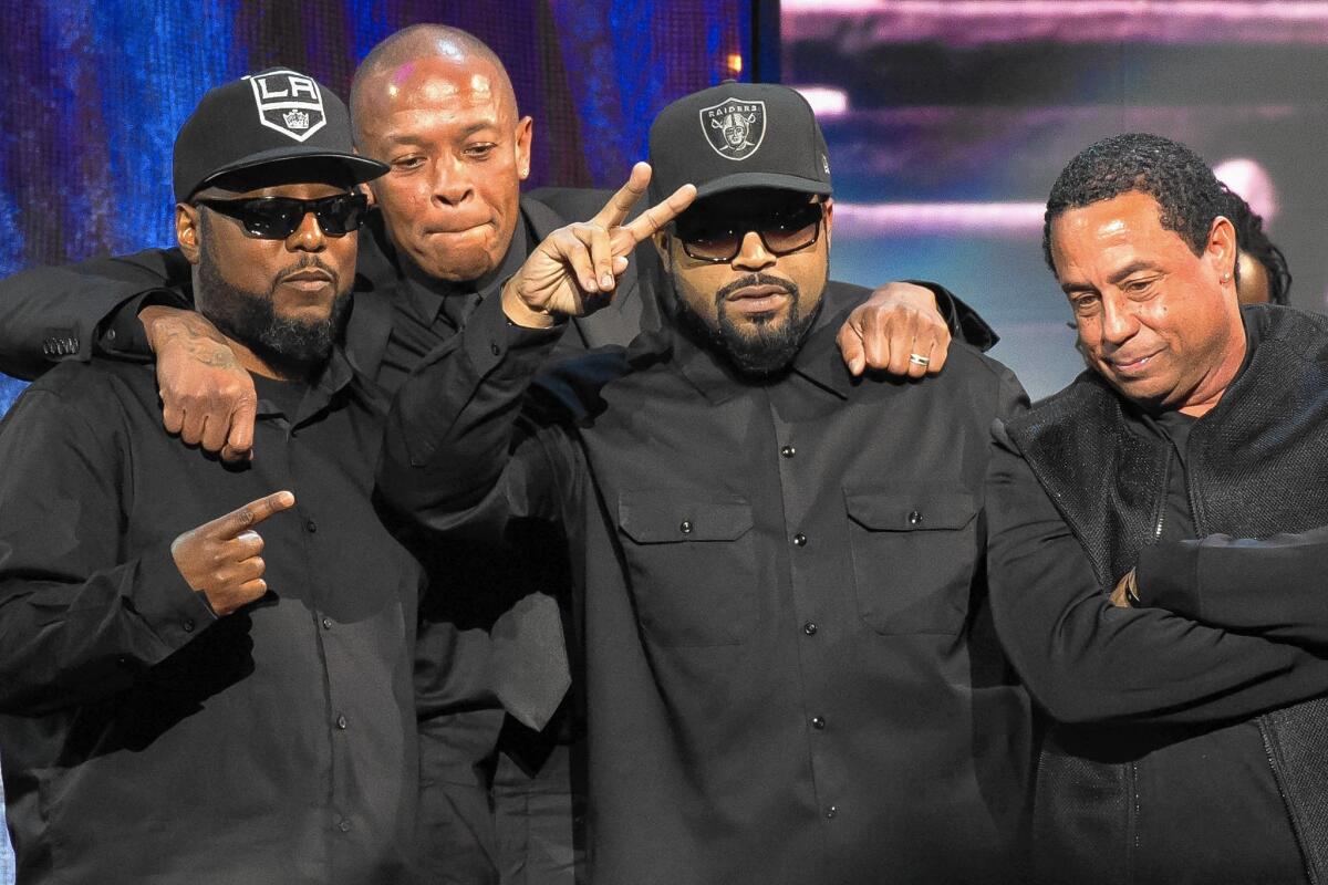 Surviving N.W.A members MC Ren, Dr. Dre, Ice Cube, DJ Yella celebrate their entrance into the Rock and Roll Hall of Fame during the induction ceremony at the Barclays Center in New York on April 8.