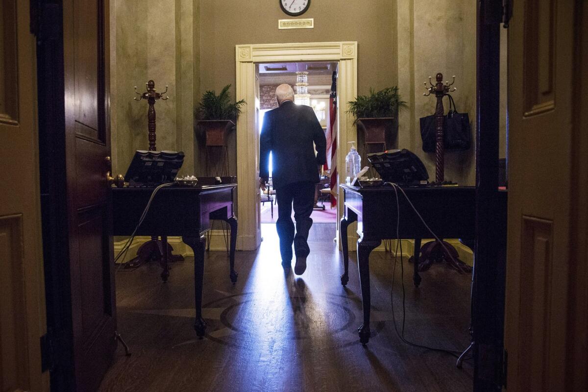Sen. John McCain (R-Ariz.) arrives at a meeting on Capitol Hill.