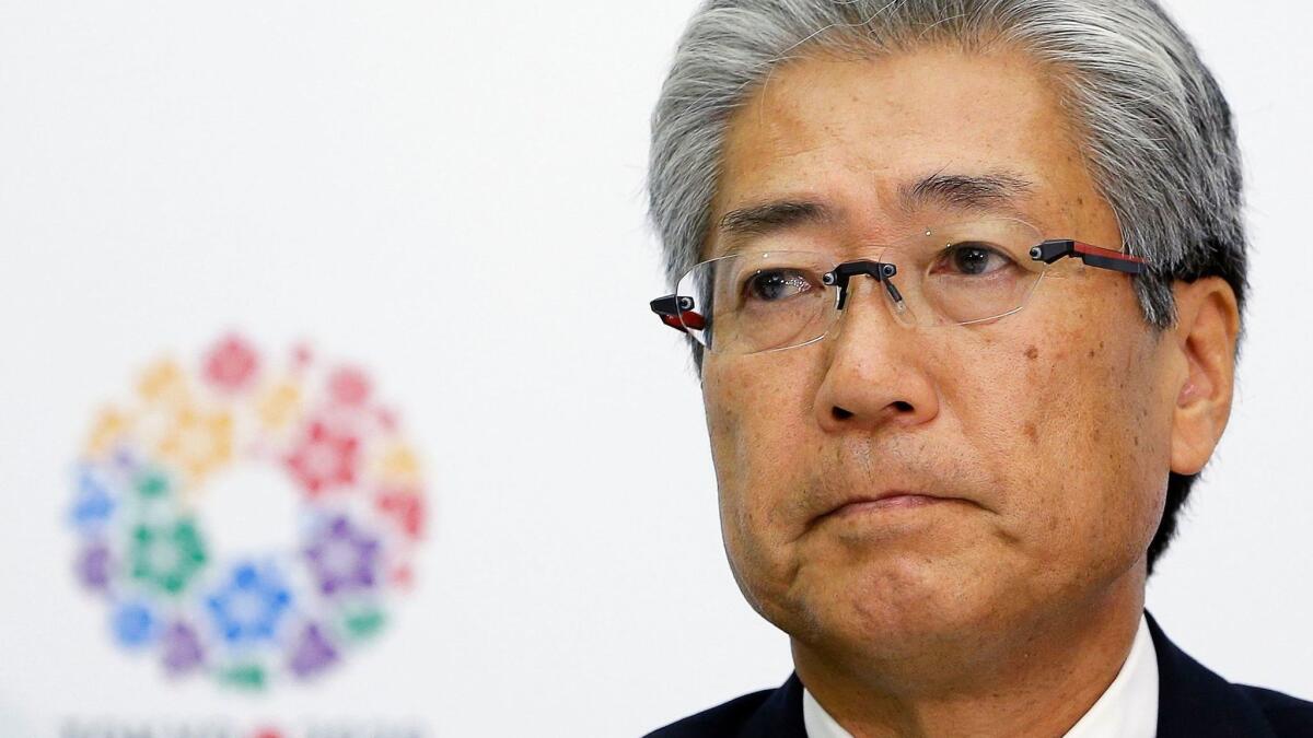 Tsunekazu Takeda stepped down Tuesday as head of Japan's Olympic committee.