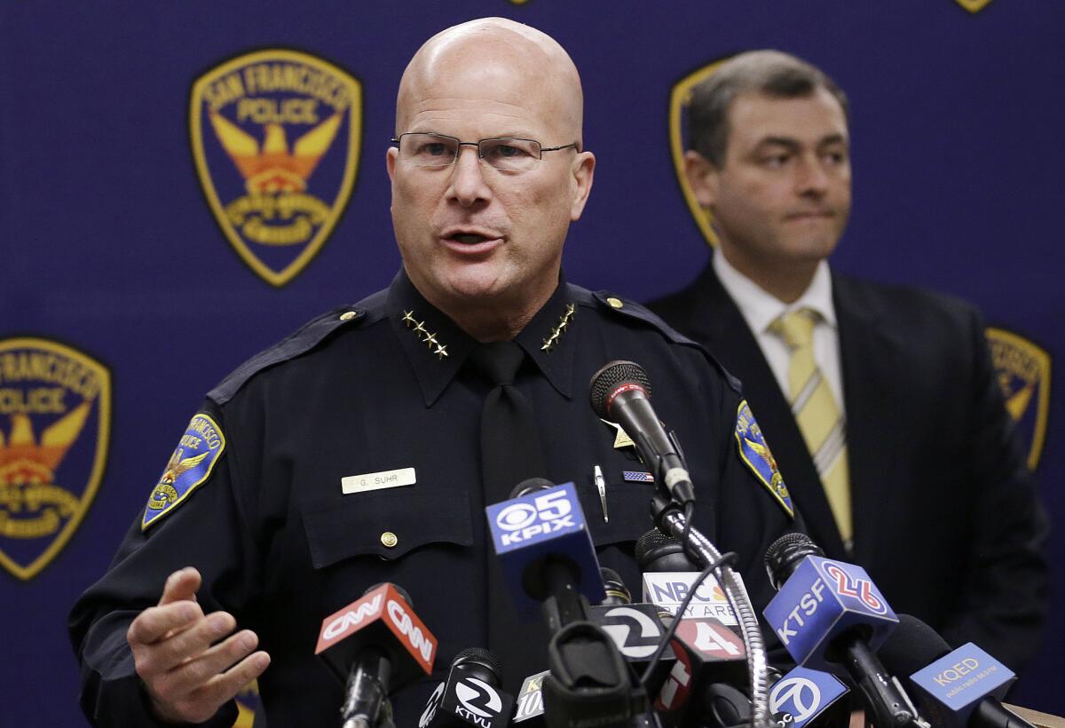 San Francisco Police Chief Greg Suhr speaks at a news conference in San Francisco. Police have taken into custody two people in the fatal stabbing of a Los Angeles Dodgers baseball fan during a fight near AT&T; Park after the Giants' 6-4 win Wednesday.