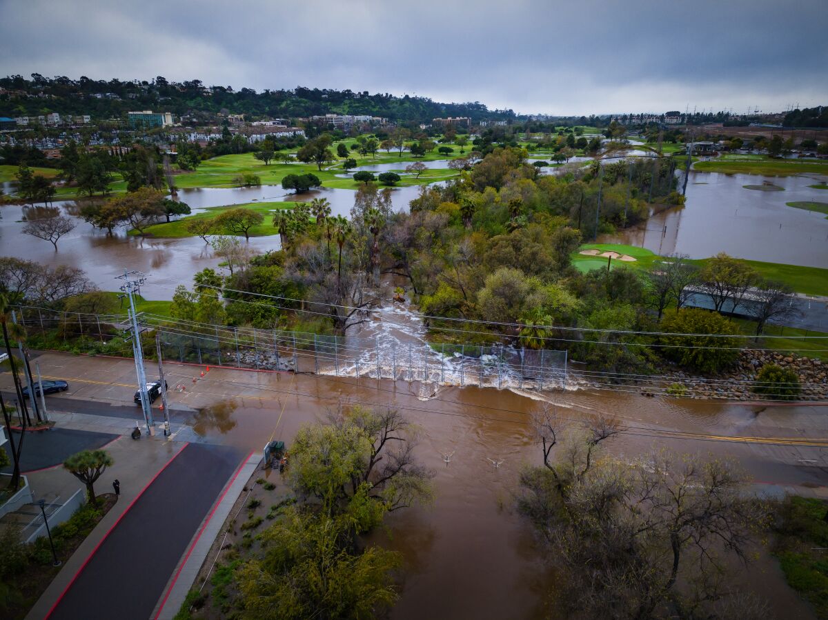 Fashion Valley Road is closed as well as the Riverwalk Golf Course because of flooding on Wednesday in San Diego.